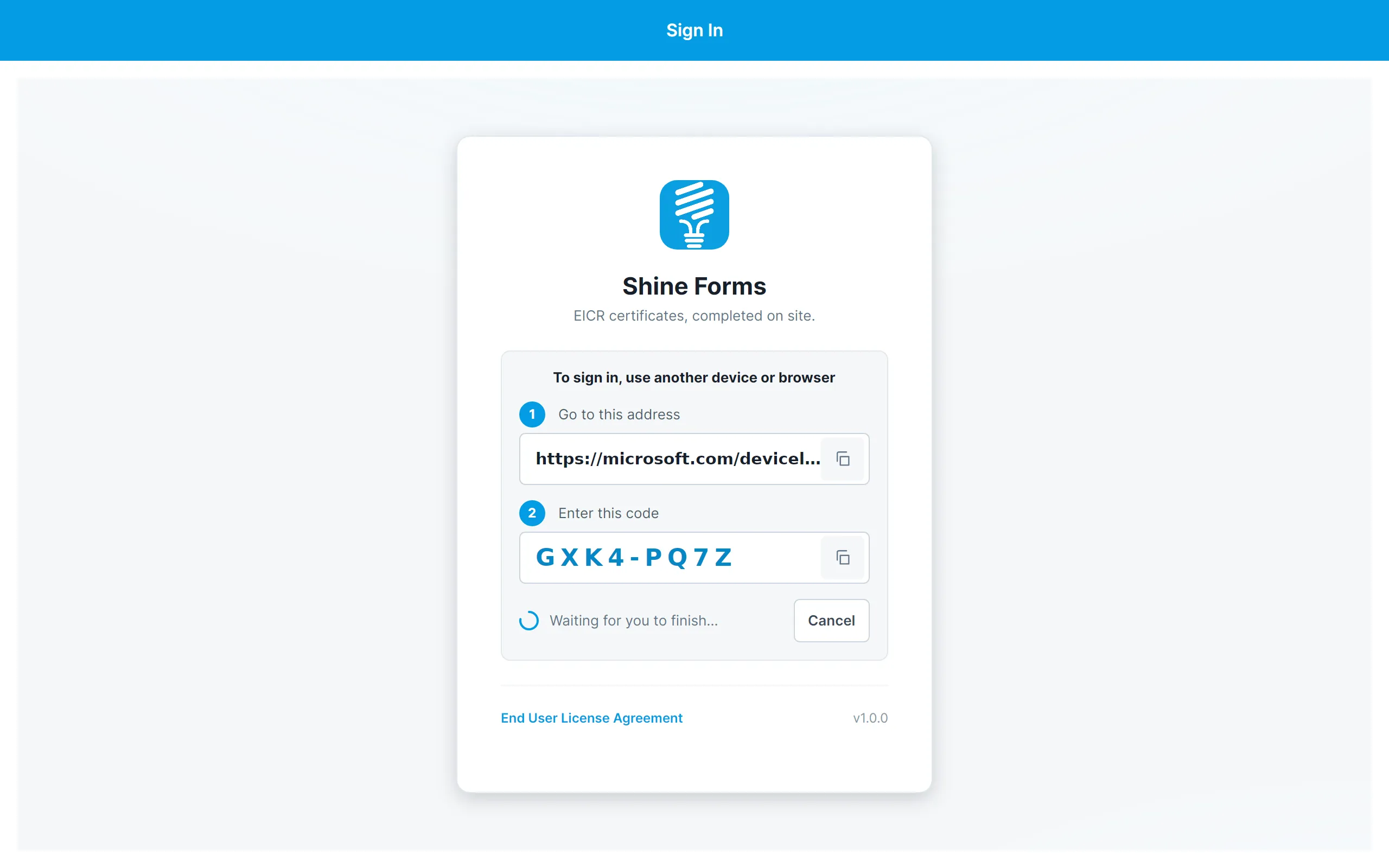 The sign-in screen showing a device code and the address to enter it at